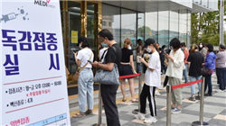 金价触及纪录高位后微跌 交易员开始获利了结